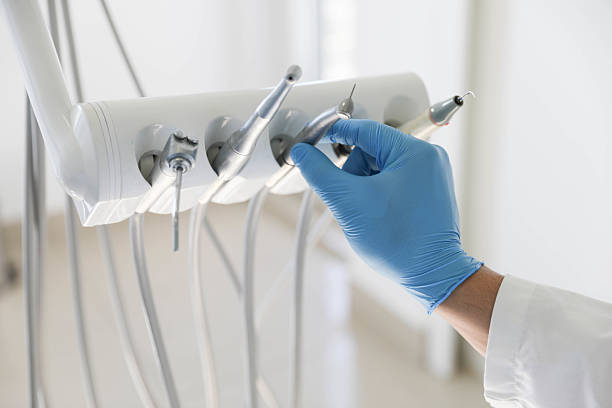 Professional Root Canal Treatment technician working in Ashland City, TN